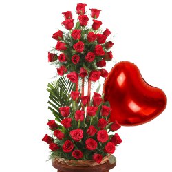 Radiant Red Roses along with a lovely Heart Shape ...