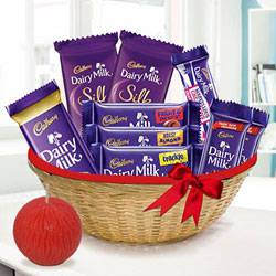 Dainty Dairy Milk Chocolate and Tea Light Diwali Basket Dainty Dairy Milk Chocolate and Tea Light Diwali Basket