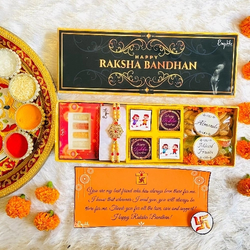 Beautiful Pearl N Metal Rakhi with Assorted Treats