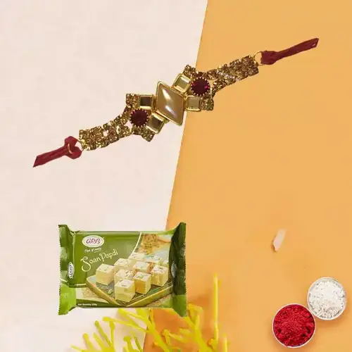 Spectacular <font color=#FF0000>Haldiram</font>'s Soan Papri with a Splendid Rakhi