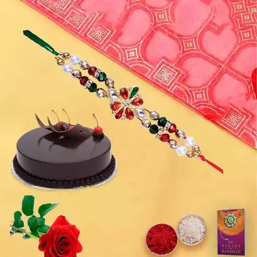 Yummy chocolaty cake and rose with free Rakhi roli tilak and Chawal