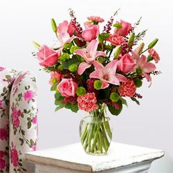 Pretty Arrangement of Lilies, Roses and Carnations with Pure Passion Pretty Arrangement of Lilies, Roses and Carnations with Pure Passion