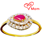Beautiful Designer Red Stone and Rhinestone Studded Fancy bangle. Beautiful Designer Red Stone and Rhinestone Studded Fancy bangle.