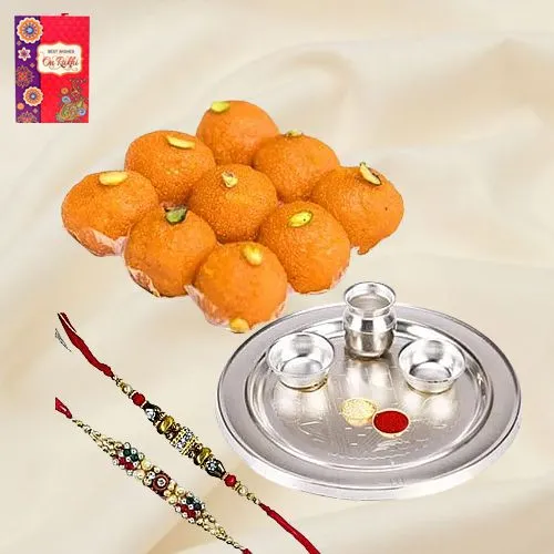 Pride-to-Possess Silver Plated Thali with <font color=#FF0000>Haldiram</font> Ghee Ladoo & 2 Designer Rakhi and Roli Tilak Chawal