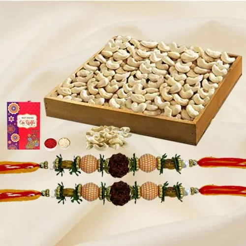 Appealing Set of 2 Rudraksh Rakhis with Cashews, Roli Chawal N Card