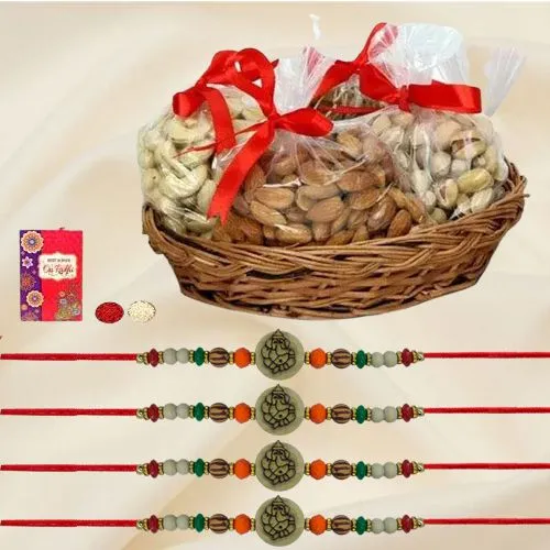 Lovely Gift of 4 Ganesh Rakhis with Exotic Dry Fruits Basket