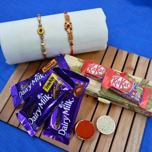 Pretty Golden Rakhi Pair N Chocolates Assortment in Bamboo Box