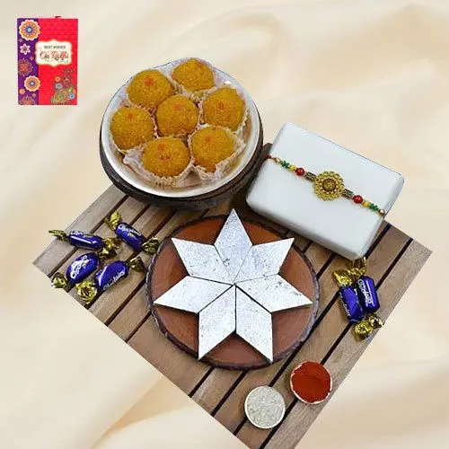 Pious Om Rakhi with Haldiram Mithai, Chocolate N Puja Thali