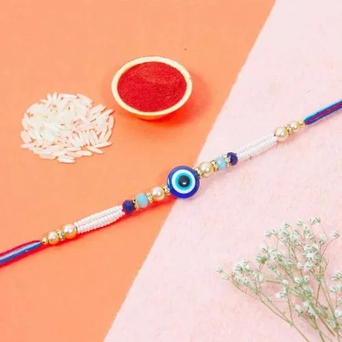 Dazzling Royal Evils Eye Rakhi with Pearl String