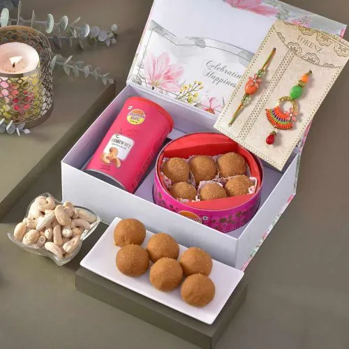 Splendid Bhaiya Bhabhi Rakhi with Sweet N Nut Box