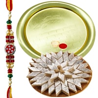 Auspicious Gift of Glorious German Silver Golden Plated Thali along with Crunchy Kaju Katli of 100 Gms from <font color=#FF0000>Haldiram</font>s Auspicious Gift of Glorious German Silver Golden Plated Thali along with Crunchy Kaju Katli of 100 Gms from <font color=#FF0000>Haldiram</font>s