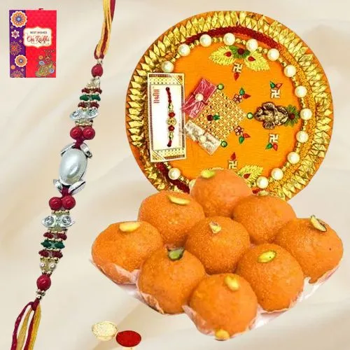 Laddoo and Designer Pooja Thali along Rakhi, Roli, Tilak and Chawal