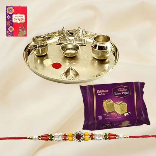 Soan Papri from Haldiram and Silver Plated Paan Shaped Puja Aarti Thali along with Rakhi