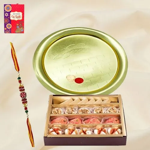 Assorted Sweets and Silver Plated Puja Thali along Rakhi, Roli, Tilak and Chawal