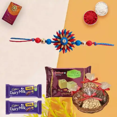 Astonishing Pearl Rakhi with Dry Fruits Chocolates n Sweets